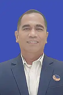 Colour photo headshot of Biem Triani Benyamin in buissness attire