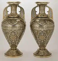 Pair of iron urns, before 1878