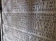 A section of the memorial wall to the victims of the massacre of the Innocents.