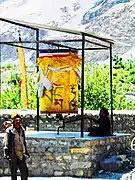 Large prayer wheel being turned. Spiti