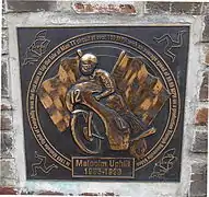 Commemorative plaque installed  into a wall during 2013 at Station Terrace, Caerphilly