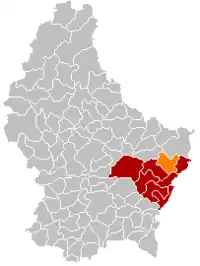 Map of Luxembourg with Manternach highlighted in orange, and the canton in dark red