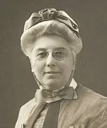 Early 20th-century woman in matron's cape