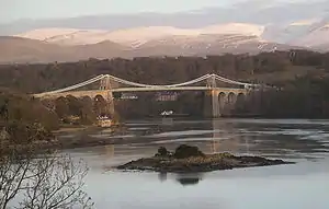 The Menai Suspension Bridge from a viewpoint on the A4080 near the Britannia Bridge