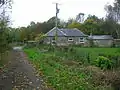 Millburn Lodge and gate; a post 1858 building. Home to one of the Eglinton Castle estate gamekeepers.