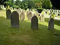 Sloping land sold to the council. Foreground headstones are of soldiers of the Royal Monmouthshire Royal Engineers, from World War I