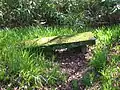 A seat near the old castle at an old entrance gate.