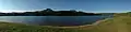 A panorama of Nagle Dam showing the dam wall on the left.