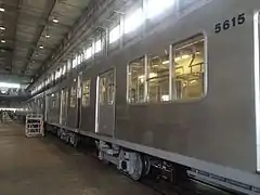 Withdrawn 5000 series cars at the Osaka Sharyo plant in August 2014 undergoing modifications ahead of shipment to Argentina