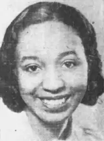 A young African-American woman, smiling