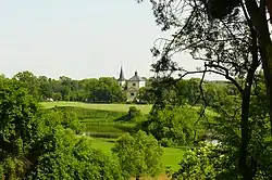 Warta River and Baroque Saints Peter and Paul church