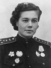 Portrait photograph of Olga Sanfirova in uniform