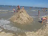 The sea moving in to surround the castle