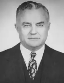 Black and white head and shoulders photo of Oscar R. Ewing, facing front