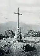 Young Mirdita man near a cross (1912)