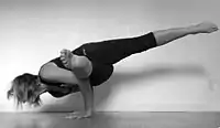 Eka Pada Koundinyasana I(lower leg on arm)