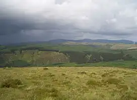 The Nant Rhuddnant gorge looking north to Cefn Coch from the summit of Pen y Garn. In the background are Y Garn(left), Pen Pumlumon Fawr and Pen Pumlumon Arwystli (right)