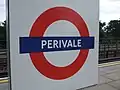 Roundel on westbound platform face.