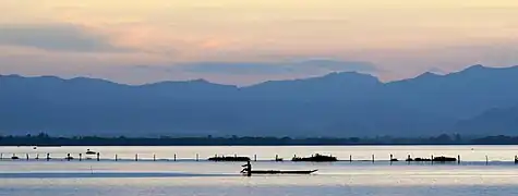 The Phi Pan Nam Range rising behind Phayao Lake