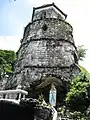 Grotto and praying area at the base of the bell tower