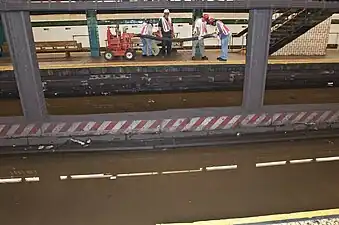 Flooding at 125th Street after a water main break