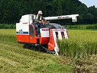 Rice combine harvester in Chiba Prefecture, Japan