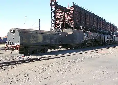 SAR Class 25NC 3437 (4-8-4) at the coal stage at Beaconsfield, South Africa