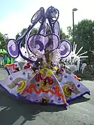 A costumed carnival dancer.