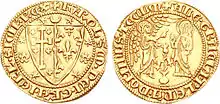 A gold coin depicting a coat of arms on one side, and an angel and the Virgin on the other side.