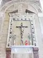 Papier-maché Crucifix on a side altar