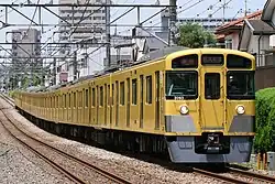 A renewed New 2000 series set 2093 on the Seibu Shinjuku Line in May 2021