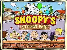 Official cover art, showing (reverse clockwise from top) Snoopy, Peppermint Patty, Sally Brown, Linus van Pelt, Charlie Brown, Lucy van Pelt, Schroeder, and Woodstock in front of a street fair