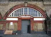 Former entrance to the station with the South Eastern and Chatham Railway initials above the doorway