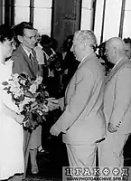 Chairman of the Council of Ministers of the Soviet Union Nikita Khrushchev (foreground right) and First Secretary of the Leningrad Regional Committee of the Communist Party of the Soviet Union Ivan Spiridonov (foreground left) congratulate the newlyweds Kirillovs at the Wedding Palace on the Red Fleet Embankment, 28