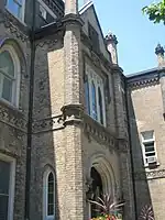 The Cochranes were responsible for this coat-of-arms carving on the Bishop's Palace at St. Michael's Cathedral Basilica in Toronto