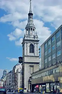 A church with an elaborate white spire.