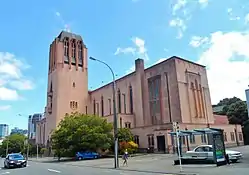 Rear/side view of cathedral. A secondary entrance is near the bell tower.