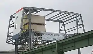 An image of a part of the station's steel structure as well as two ship containers in Bremerhaven during an open-house day