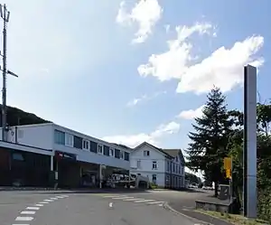 Two-story rectangular station building with flat roof