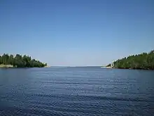 Sudenväylä (also known as Kraaselin kaivanto) boating channel, Haukipudas, Finland. Seen from a vessel approaching from Kuivasmeri bay towards Kellonlahti bay. The island on the left (south) is Kellon Kraaseli, on the island on the right (north) is Rapakari