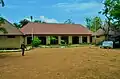 Sumu Wildlife Park Ranger walking towards the visitor's reception building