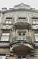 The art nouveau sunflower building designed 1901–1905 by A. Walczok at 2, Mickiewicz Street in Bielsko. Before World War II it was owned by Leo Kohany, perhaps a distant relative of Miriam Kohany's family, photo by Ewa Kuryluk, 2003.