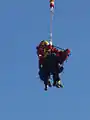 HFRS technicians landing in tandem with the aerial rescue platform