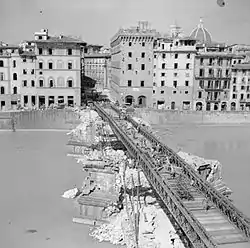 Bailey bridge over the River Arno, Florence, built on the piers of the original Ponte Santa Trinita (August 1944)