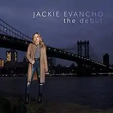 Photo of Evancho standing in front of the Manhattan Bridge, New York City