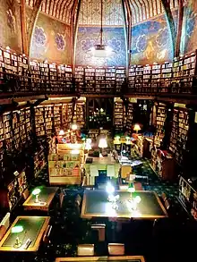 The Old Library at night as viewed from the gallery.