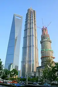 The SWFC, Jin Mao Tower and incomplete Shanghai Tower (far right) in August 2012.