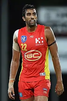 Tom Nicholls playing for the Gold Coast in 2019