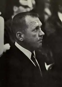 Bartlett in coat and tie, taken during game