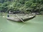 Traditional Miao Boat used to travel down rapids for trading goods.